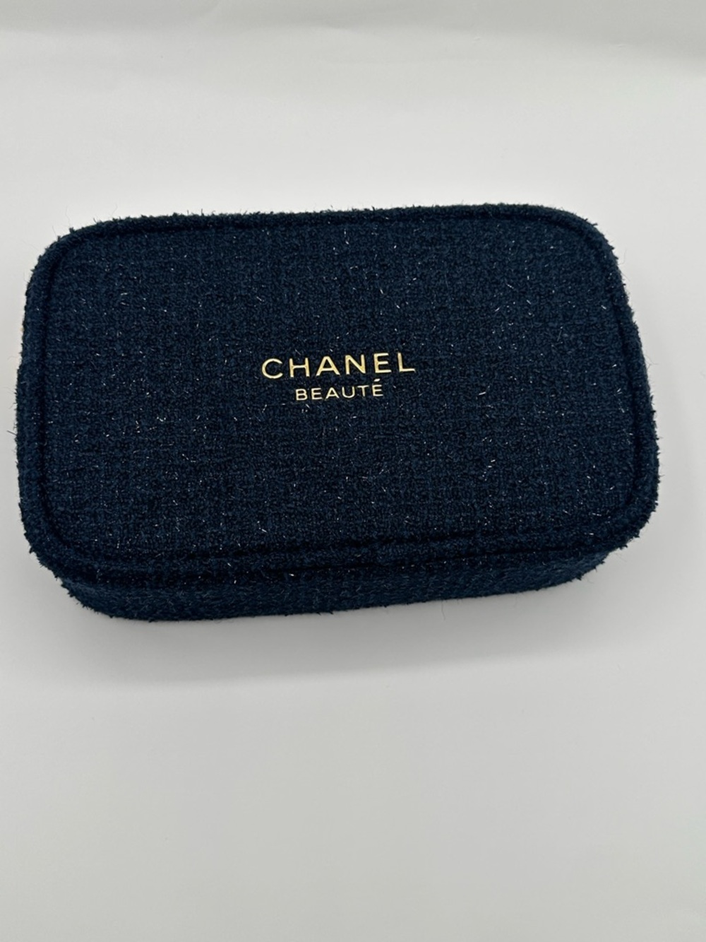 CHANEL Tweed Cosmetic Pouch in Navy with Gold Logo